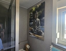 Plexiglas schilderij Boeddhabeeld in steen rustgevend