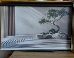 Rolgordijnen Serene zentuin met geharkt zand, gladde stenen en een bonsai